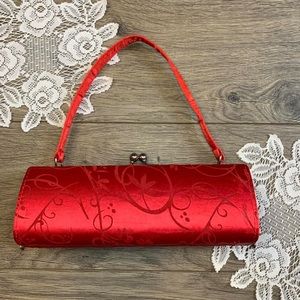 Vintage Red Round Shiny Satin Handbag With Floral Accents And Silver Hardware.